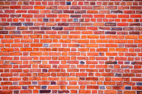 Bricks wall texture background. Retro brickwall patterned surface. Bricks masonry stonework structure. Bricks rustic grunge texture.