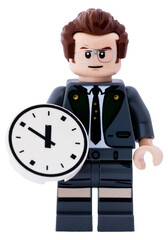 Naklejka premium Dortmund - Deutschland 15. April 2026 - Lego Minifigur Mann mit einer Uhr in der Hand