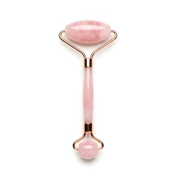 Pink rose quartz facial roller with rose gold metal frame on a white background