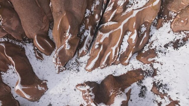 Snow-covered Rose Valley Near G&ouml;reme In The Cappadocia Region Of Turkey. Aerial Topdown drone Shot