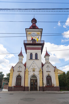 Rava-Ruska Town Hall with clock tower in Lviv region, Ukraine