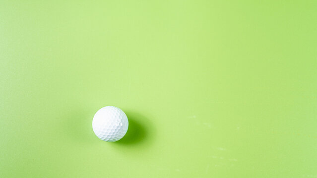 golf ball on green background