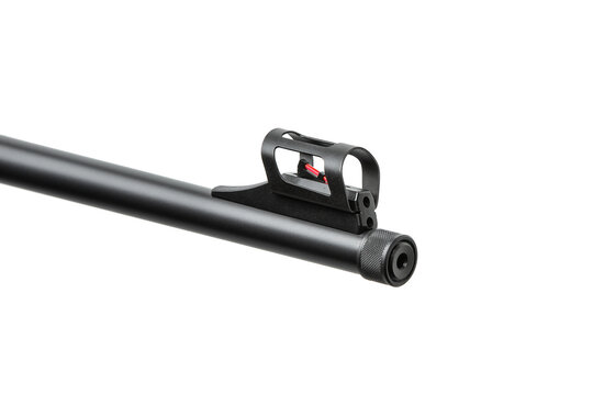 Close-up of a rifle barrel muzzle with fiber optic front sights on a white back