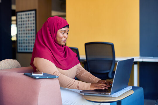Businesswoman working in a modern co working space