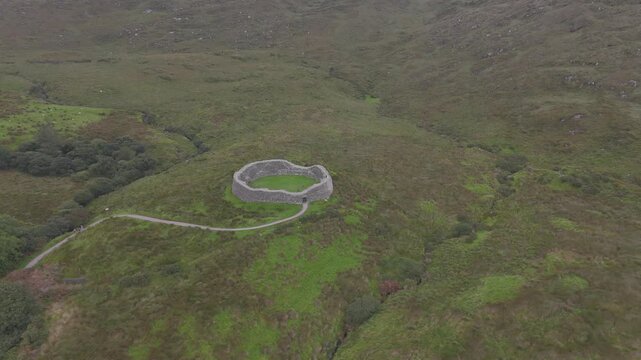 Staigue Fort is a remarkably preserved Iron Age ringfort located on the Iveragh Peninsula in County Kerry, Ireland, likely built between 300 and 400 CE.
