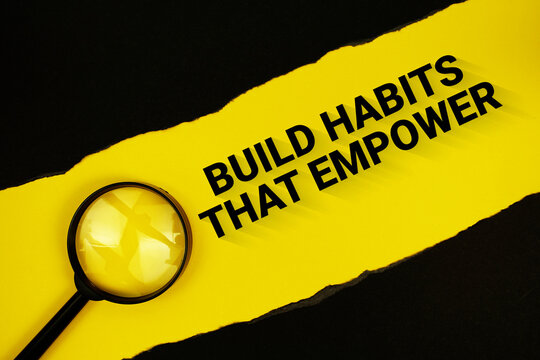 Build Habits That Empower text on yellow with black paper torn ripped and magnifying glass
