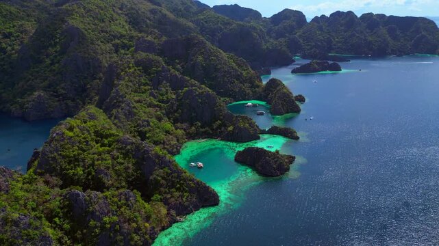Coron Lagoon with limestone karsts turquoise waters. Best aerial view drone