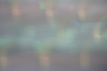 Fototapeta premium Abstract soft bokeh background with hazy pastel colors and glowing light effects.
