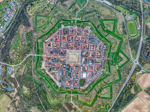 Aerial view of the octagonal fortress city with its star-shaped walls and grid-patterned streets, a testament to military engineering, Neuf-Brisach, Grand Est, France.