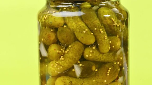 video of pickled cucumbers in a jar