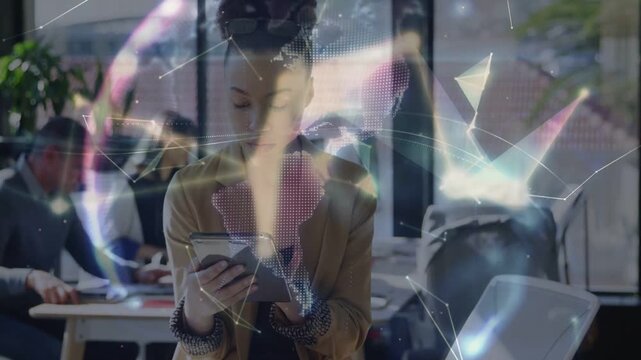 Woman tapping tablet and causing hologram globe to wrap around her, analyzing tech data for team