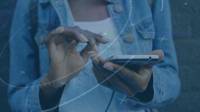 Vertical video: Woman holding phone while right hand tapping and swiping, overlay arcs guiding tech
