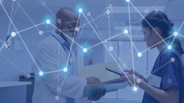 Vertical video: Doctor writing, nurse viewing tablet, handoff spurring medical network for review