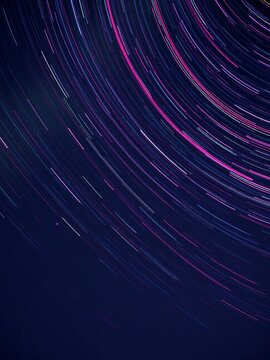 Streaks of vibrant light paint the night sky in long exposure photography,  blur,  abstract light