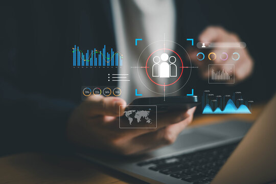 young entrepreneur using AI big data analysis and cloud technology to collect customer data and display on application dashboard from digital tablet to understand sale forecast and marketing plan
