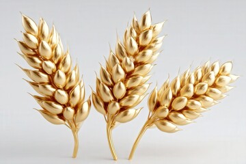 Fototapeta premium Three golden wheat ears isolated on a light background symbolizing harvest, wealth and prosperity