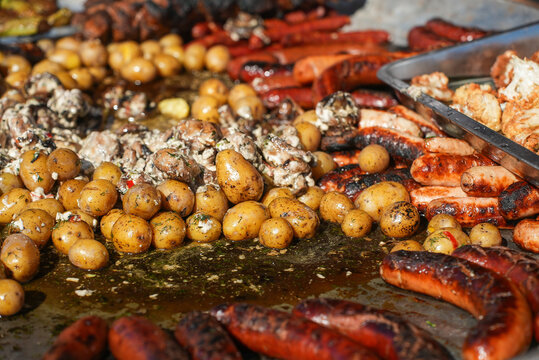 Mediterranean appetizers table concept. Platter with antipasto selection, grilled vegetables, olives, nuts and roasted bread. Overhead view