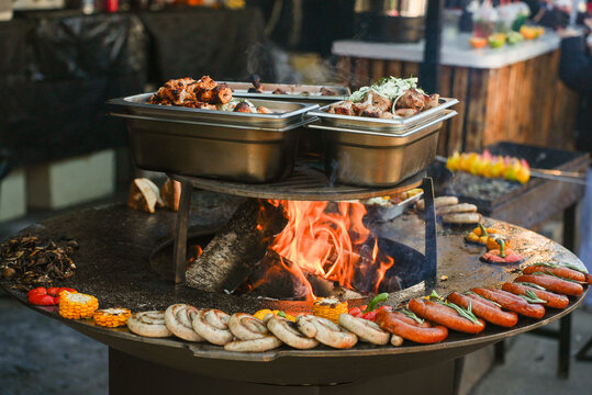 Mediterranean appetizers table concept. Platter with antipasto selection, grilled vegetables, olives, nuts and roasted bread. Overhead view