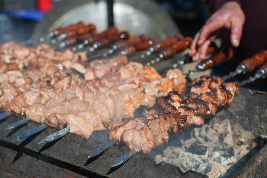Shish kebab. ork meat threaded onto skewers and grilled.