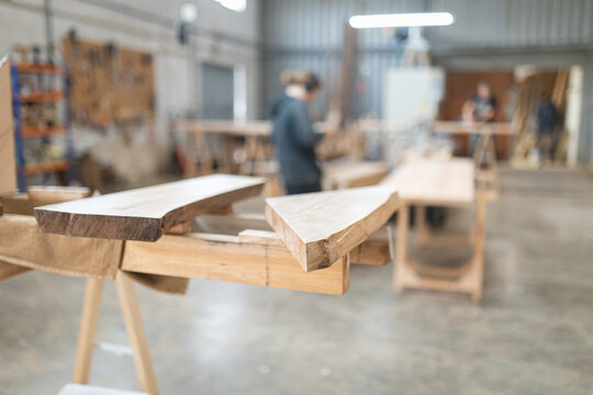 Wood planks ready for carpentry work in workshop
