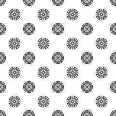 Tire pattern with wheels creating a seamless monochrome background design © nsit0108