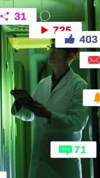 Mature Korean engineer scanning racks with tablet, causing notifications drifting while inspecting