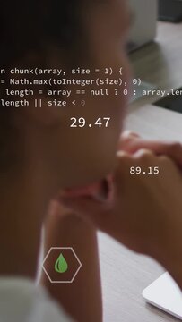 Vertical video: Code appearing, woman watching hex icons floating and updating, showing live trends