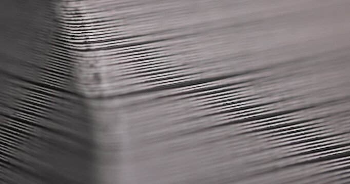 cardboard cards in a pack, macro ends of a stack of cardboard cards with smooth lines and thin gaps in daylight with a clear contour and an organic surface of paper material.