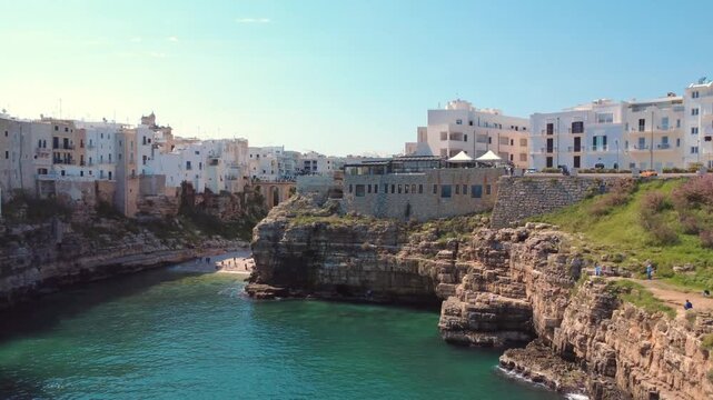 Polignano a Mare, side ways aerial shot