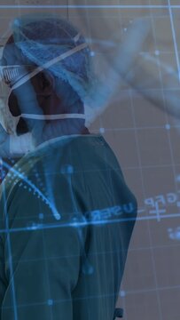 Vertical video: Frames moving senior doc standing blue data overlay sweeping across guiding surgery