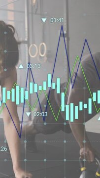 Vertical video: Pair doing plank rows on KBs with overlay appearing, charts tracking fitness reps
