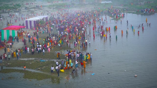 Chhath Puja at Kalindi Kunj, New Delhi, where devotees come together along the Yamuna River to offer prayers to the Sun God during sunrise and sunset