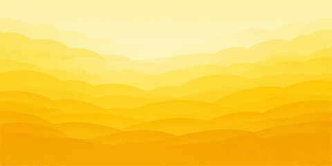 Fototapeta premium A breathtaking landscape view of the orange sun setting over the silhouette of mountain peaks under a glowing sky filled with soft clouds and evening light at dusk
