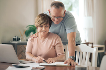 Obraz premium Couple, happy and finance with notebook in home with typing, checklist and report for investment in living room. Mature people, computer and documents with admin, asset management and budget in house