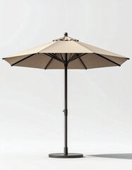 Obraz premium Beige Outdoor Patio Umbrella with Dark Pole and Base on White Background