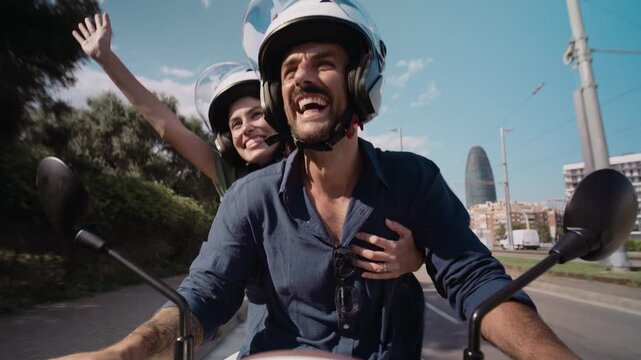 Video of beautiful and happy couple riding around the city on a motorbike