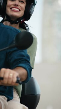 Video of beautiful and happy couple riding around the city on a motorbike