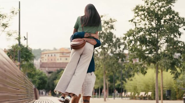 Video of cute couple having fun together in a park