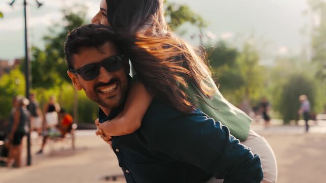 Video of cute couple having fun together in a park