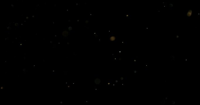 Super slow motion (1000 fps) floating dust particles in the air, isolated on black background. Cinematic atmospheric shot with soft light, depth and abstract texture.