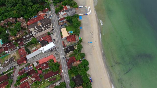 Aerial Dolly In Brazil Coastal Road Traffic Jungle Village Beach, Brazilian jungle coastline of Maresias Sao Sebastiao
