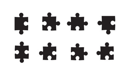 Naklejka premium Eight black puzzle pieces arranged in two rows against a white background