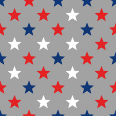 Obraz premium Seamless pattern featuring vibrant red blue and white stars arranged uniformly on a simple neutral grey background surface design