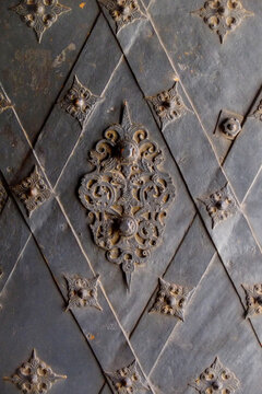 Dark diamond iron panel with ornate center detail