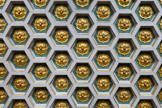 White and gold honeycomb ceiling pattern background