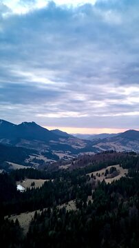 Forward Motion Drone Hyperlapse of Mountain Peaks at Dusk