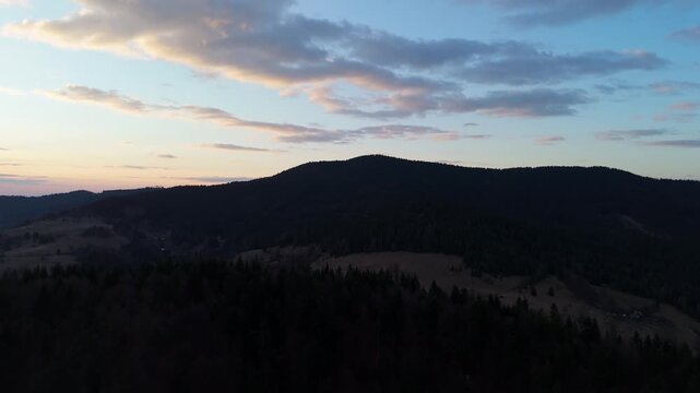 Aerial View of Dark Mountain Ridge at Evening Twilight