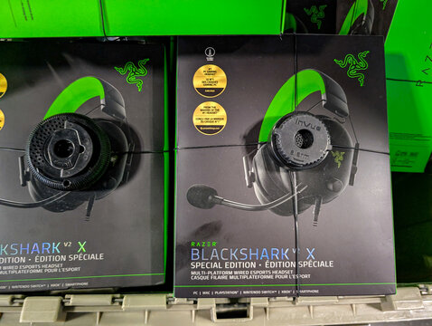 Canada, Montreal, 22 December 2025 : Headsets in store display with security devices attached to packaging