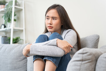 Fototapeta premium woman sitting on sofa