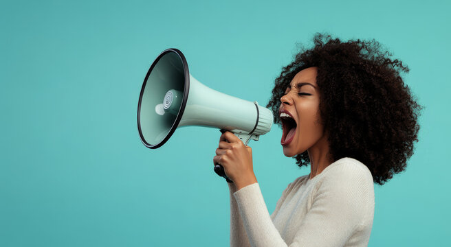 excited young african american woman with curly hair, holding a megaphone and screaming,Promotion, action, holiday, ad, job questions. Vacancy. Business discount concept, communication, information